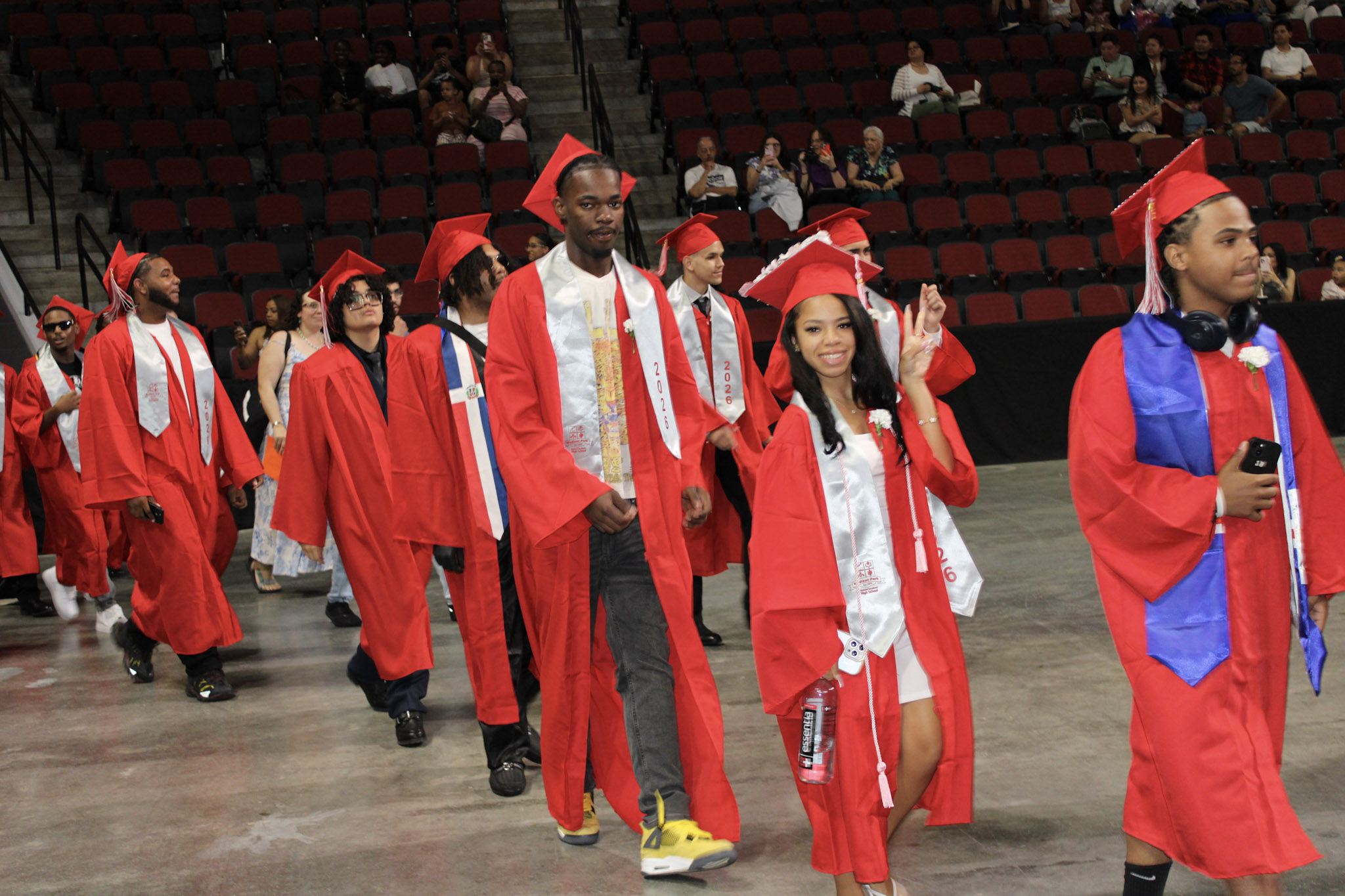 MP 2026 graduates walk into BU Agganis Arena.